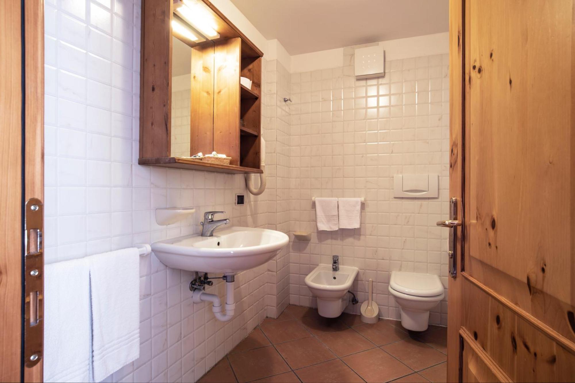 Sporting Aparthotel San Martino Di Castrozza Buitenkant foto